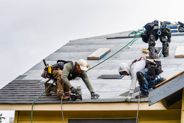 Professional Roofing technician working in Millwood, NY
